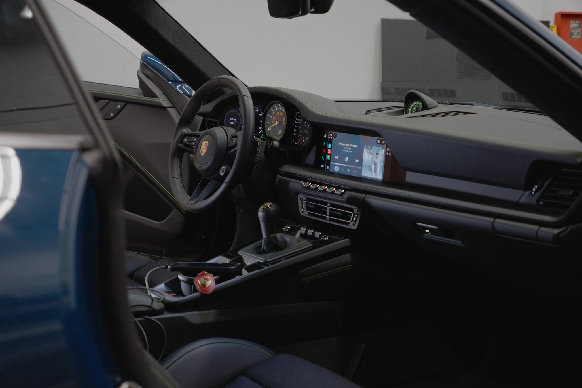 Custom Sound System being demonstrated inside a porsche