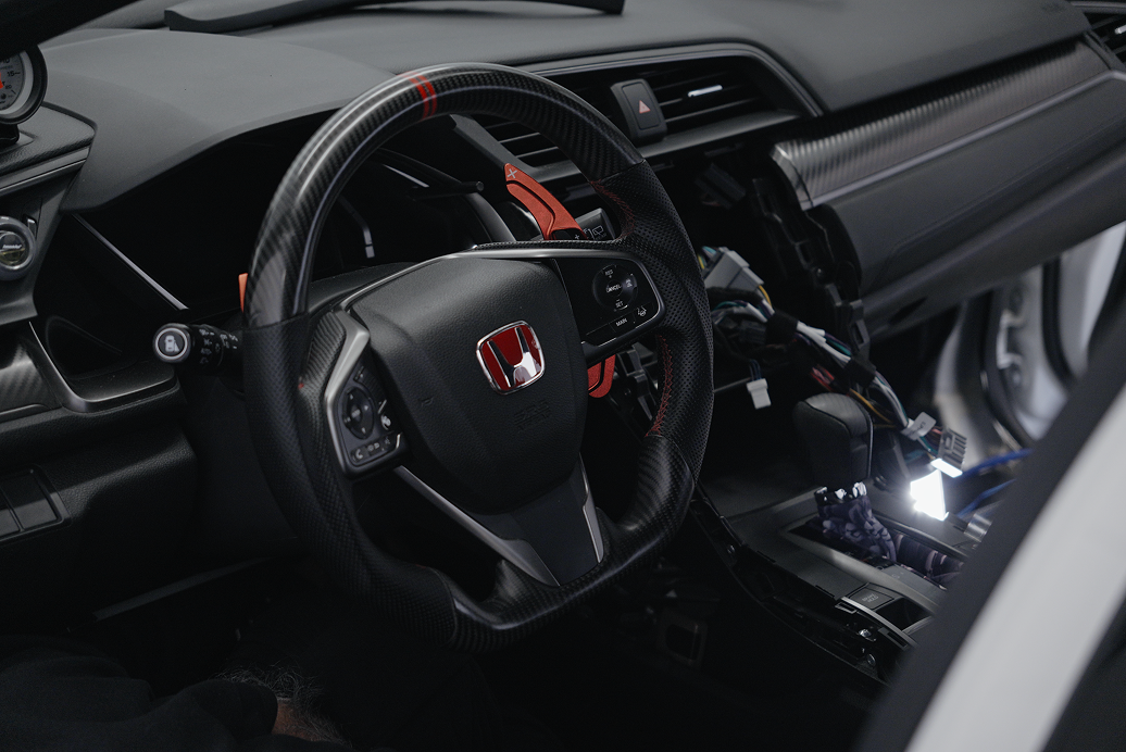 Honda civic sport interior during a car audio upgrade