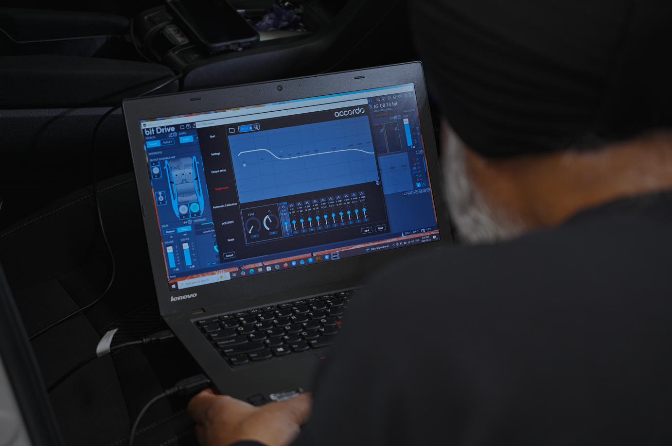 Man tuning a audison porsche audio system
