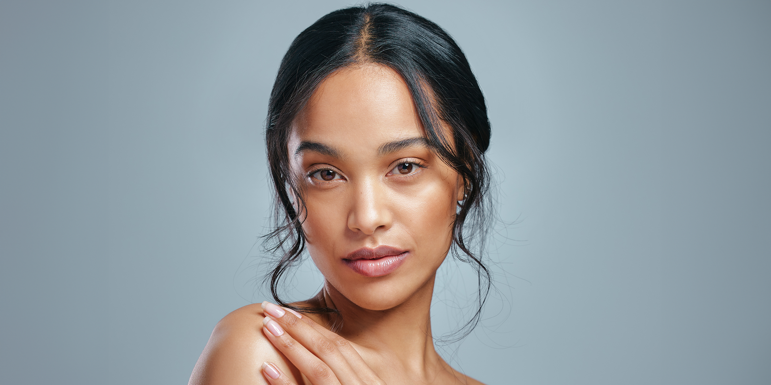 A woman smiling