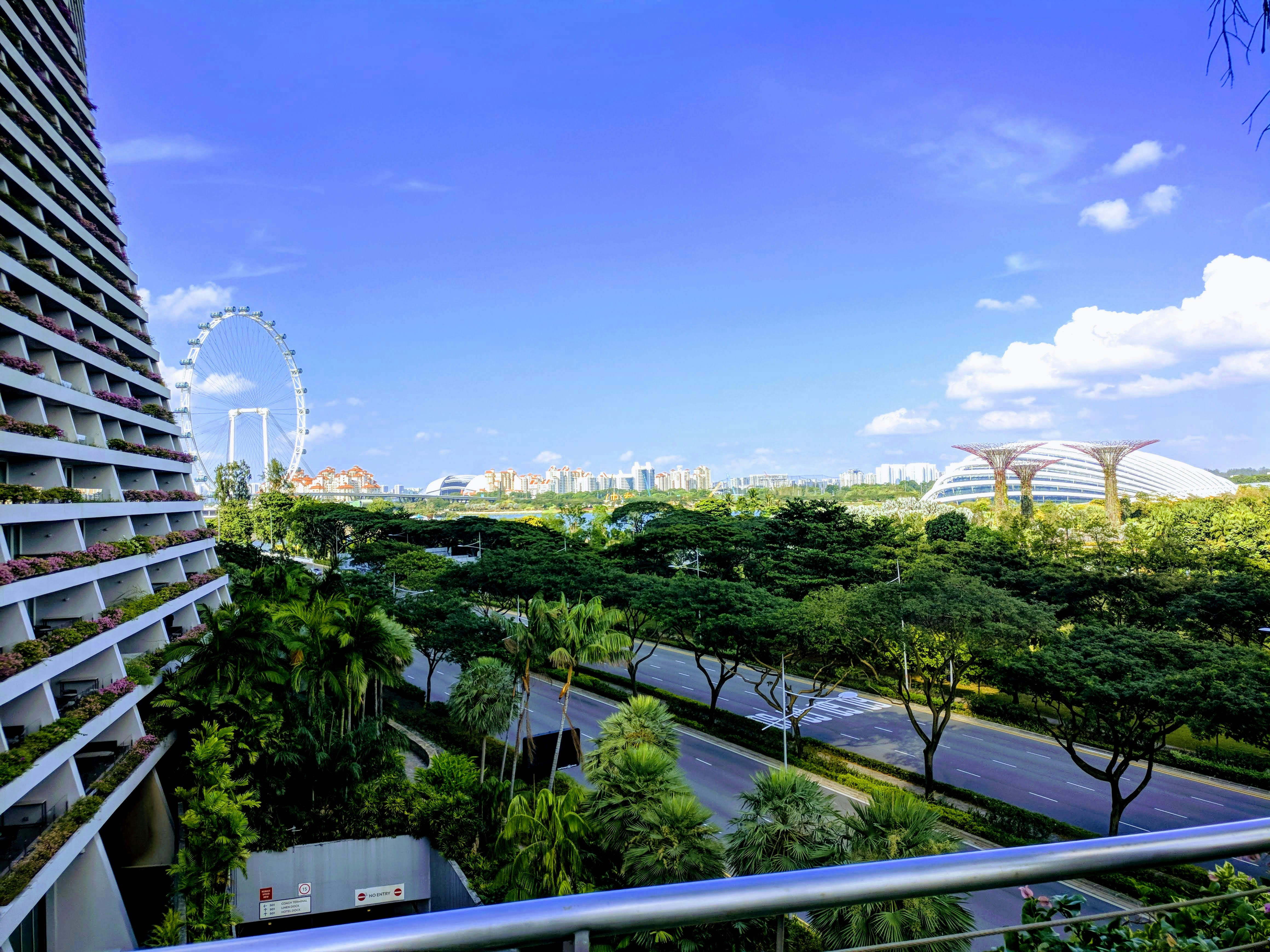 Image of a lush, green city saturated with many city parks.