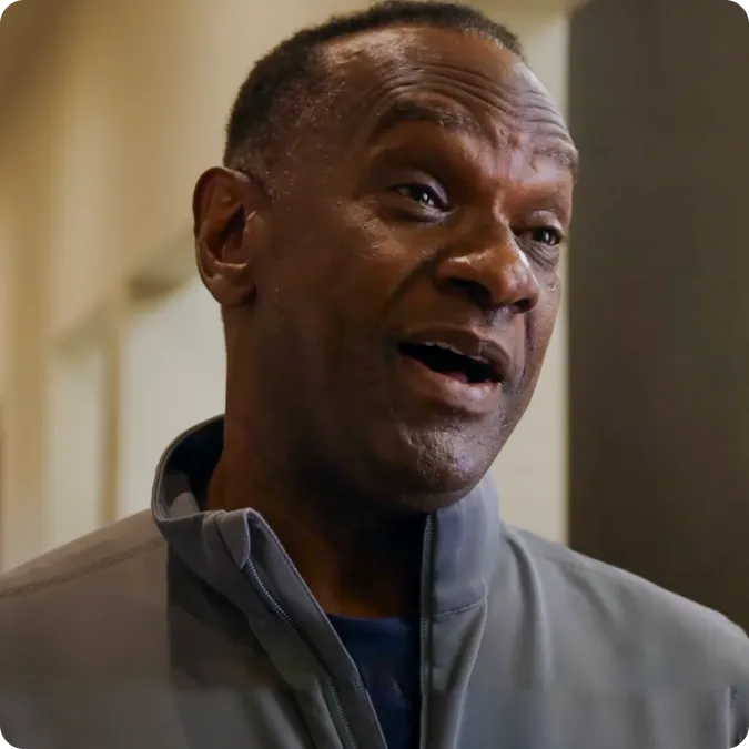 A close up of a person wearing a jacket.
