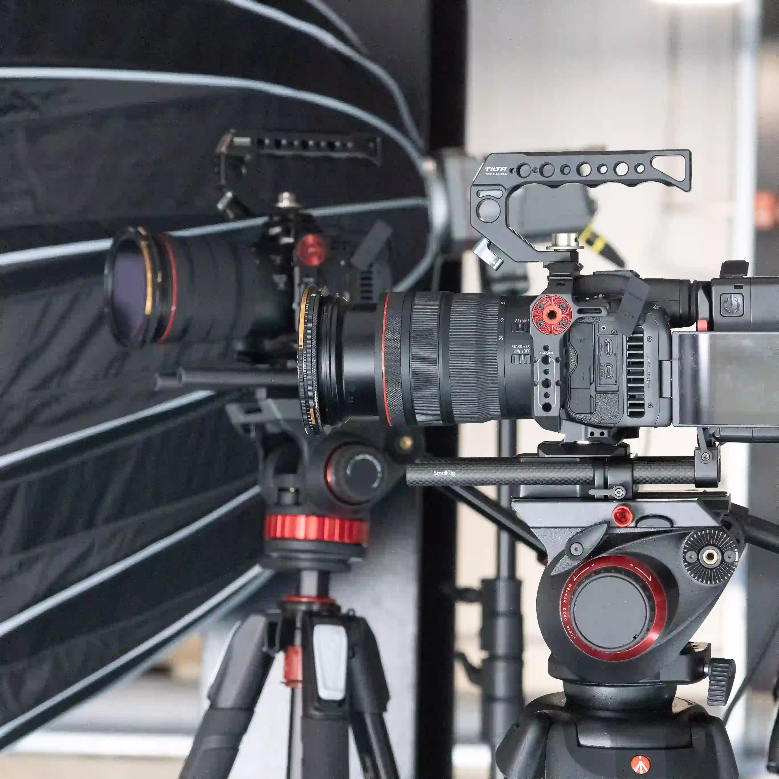 Camera rigs and tripods lined up—Chesser Media equipment and prep area.