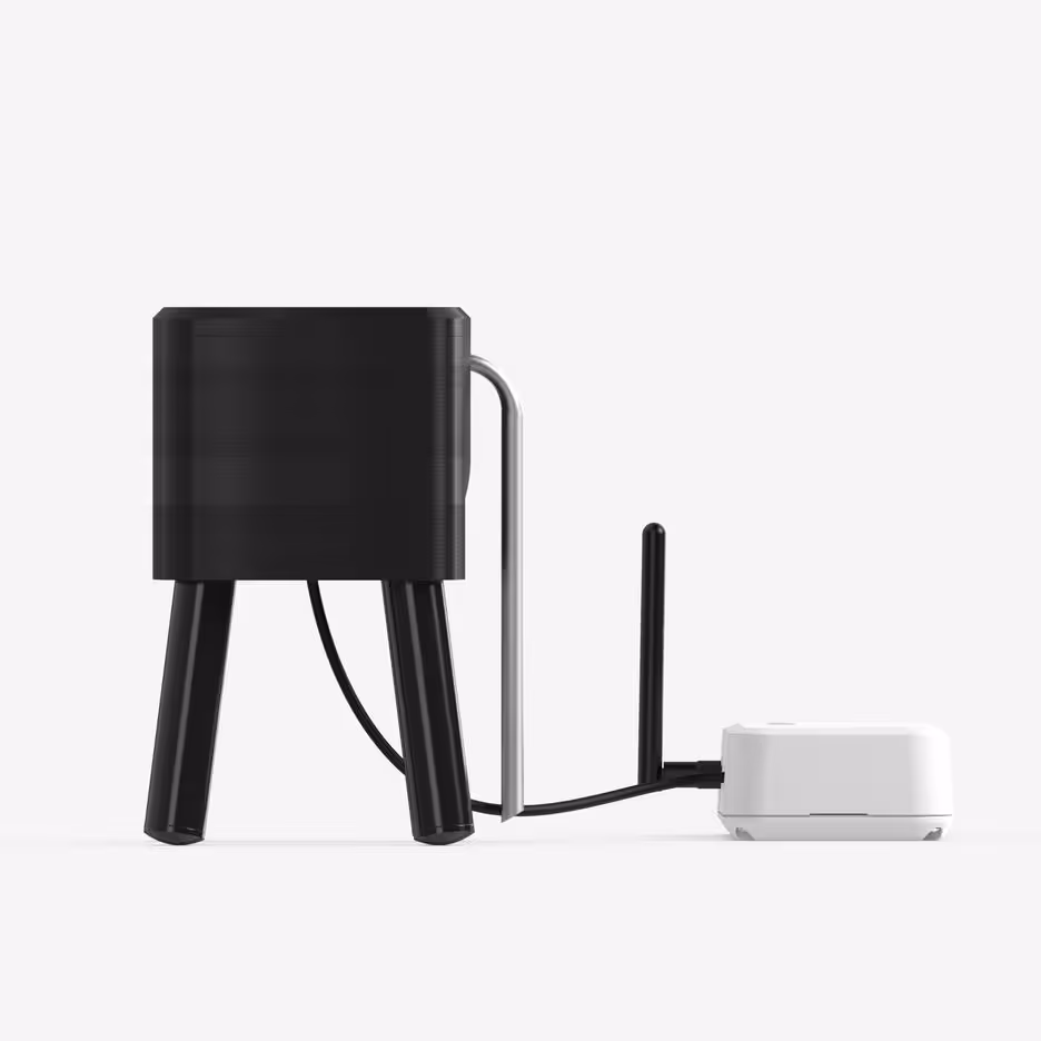 Side view of AROYA drip and drain station sensor module connected to white data unit with antenna