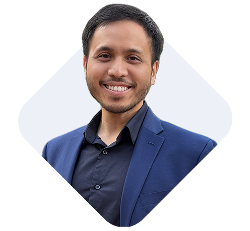 Headshot of Veura CXO Julius Caesar Magsino, smiling for the camera.