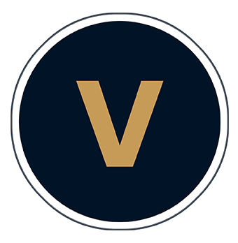 The letter V in a circle.