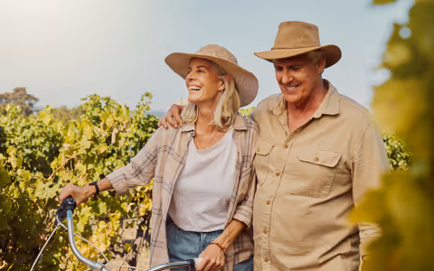 Couple walking in a vinyard