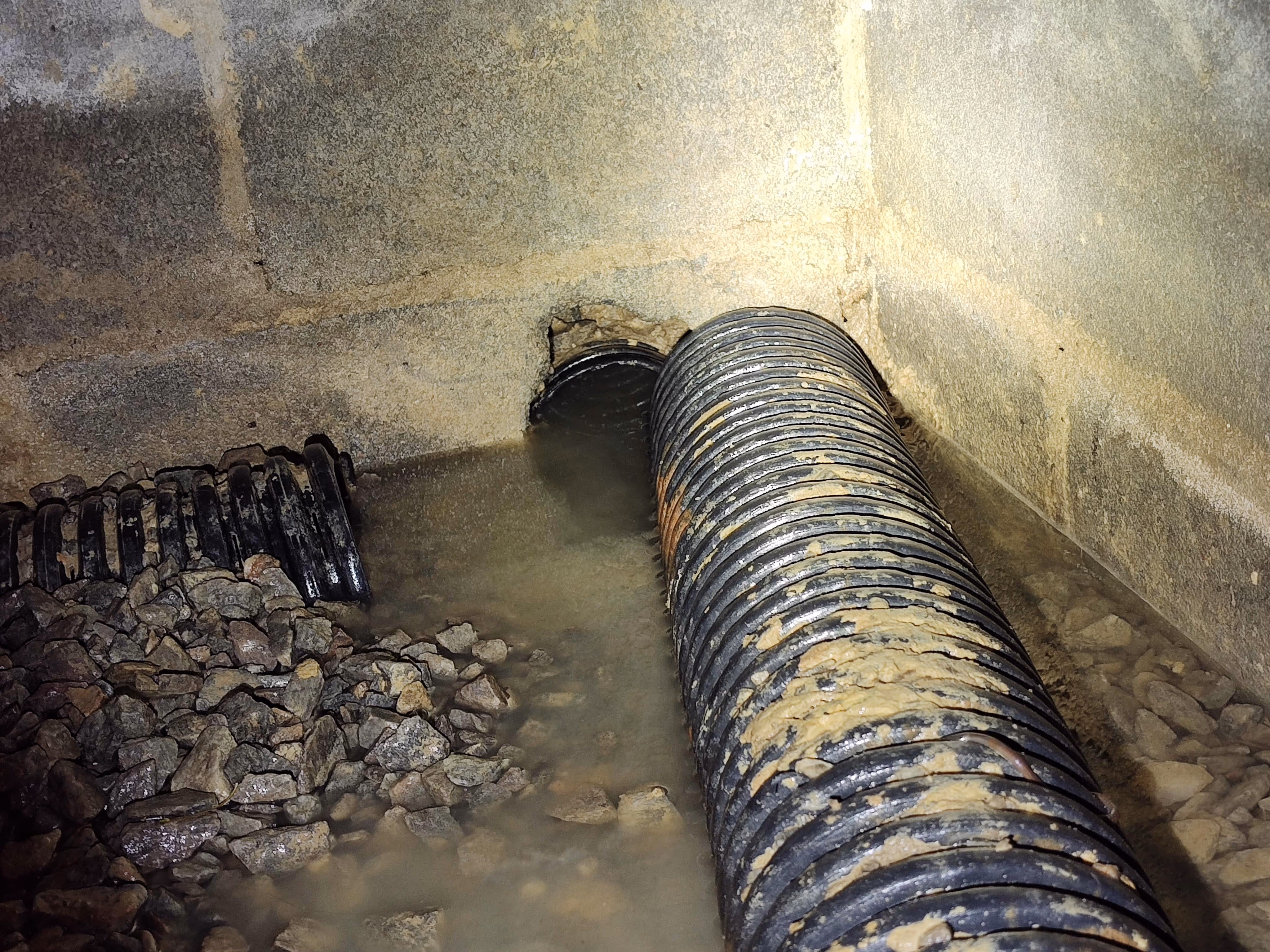 broken drain pipe flooding crawlspace