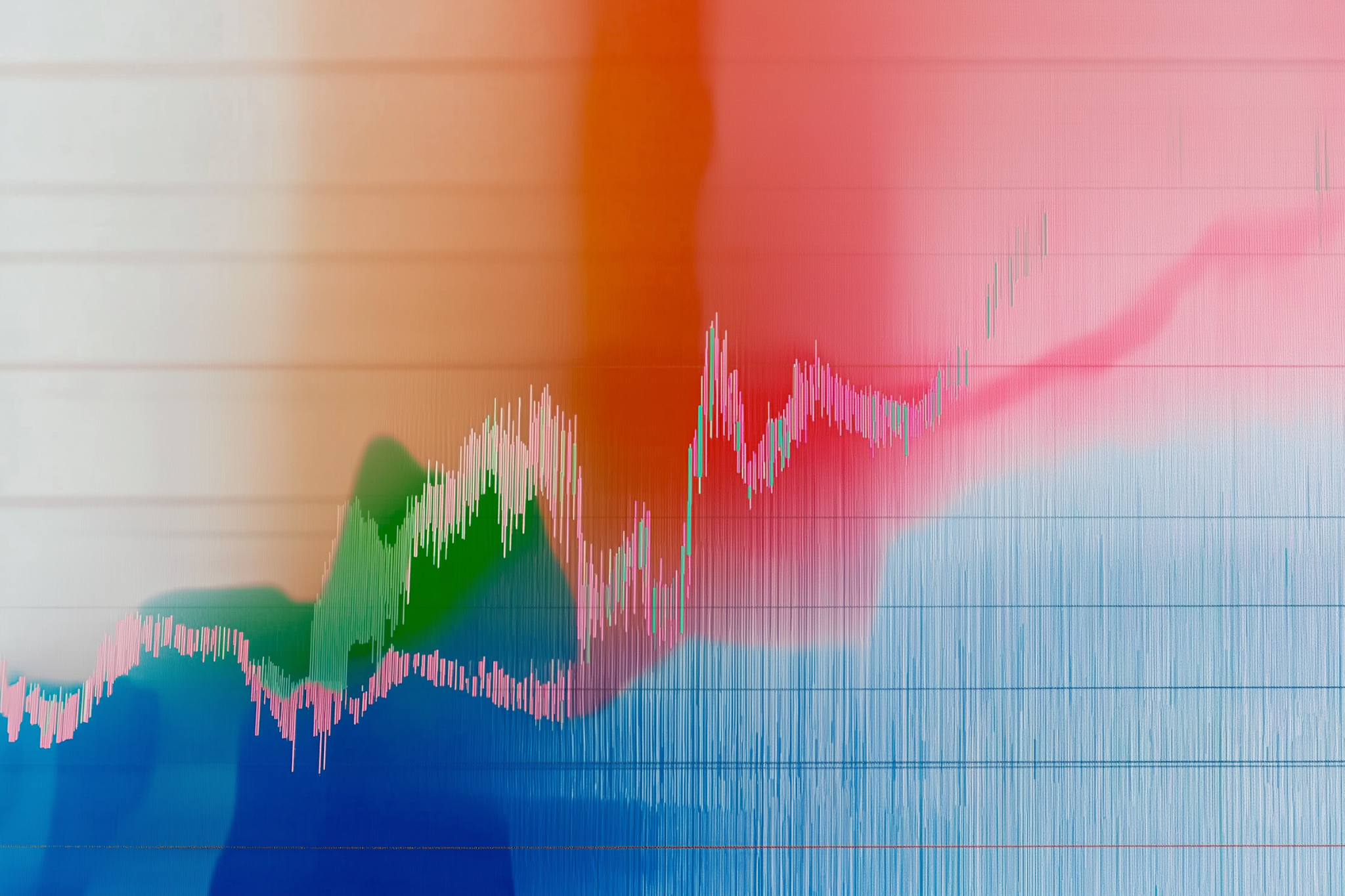 Abstract chart-like graphic of jagged blue and orange lines fading into soft color.