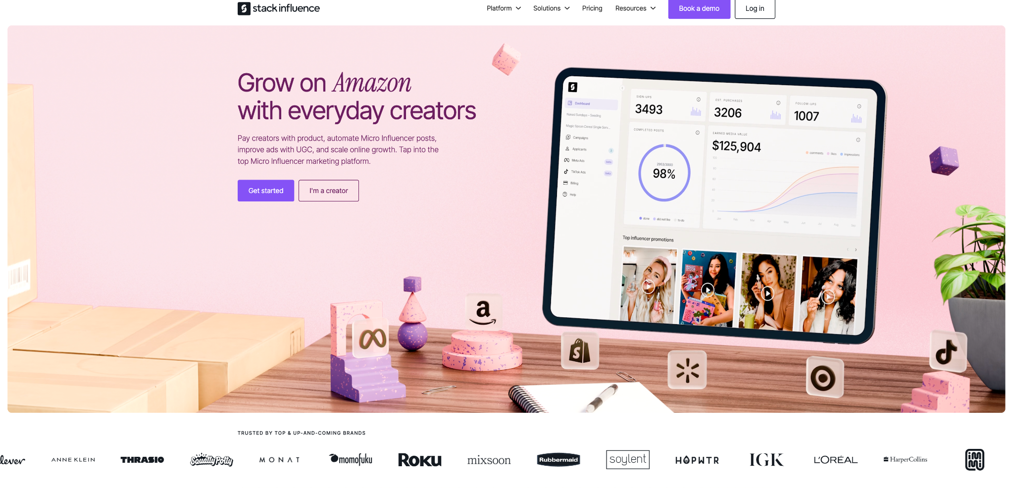 Stack Influence homepage with a campaign dashboard, creator photos, and the headline Grow on Amazon with everyday creators.