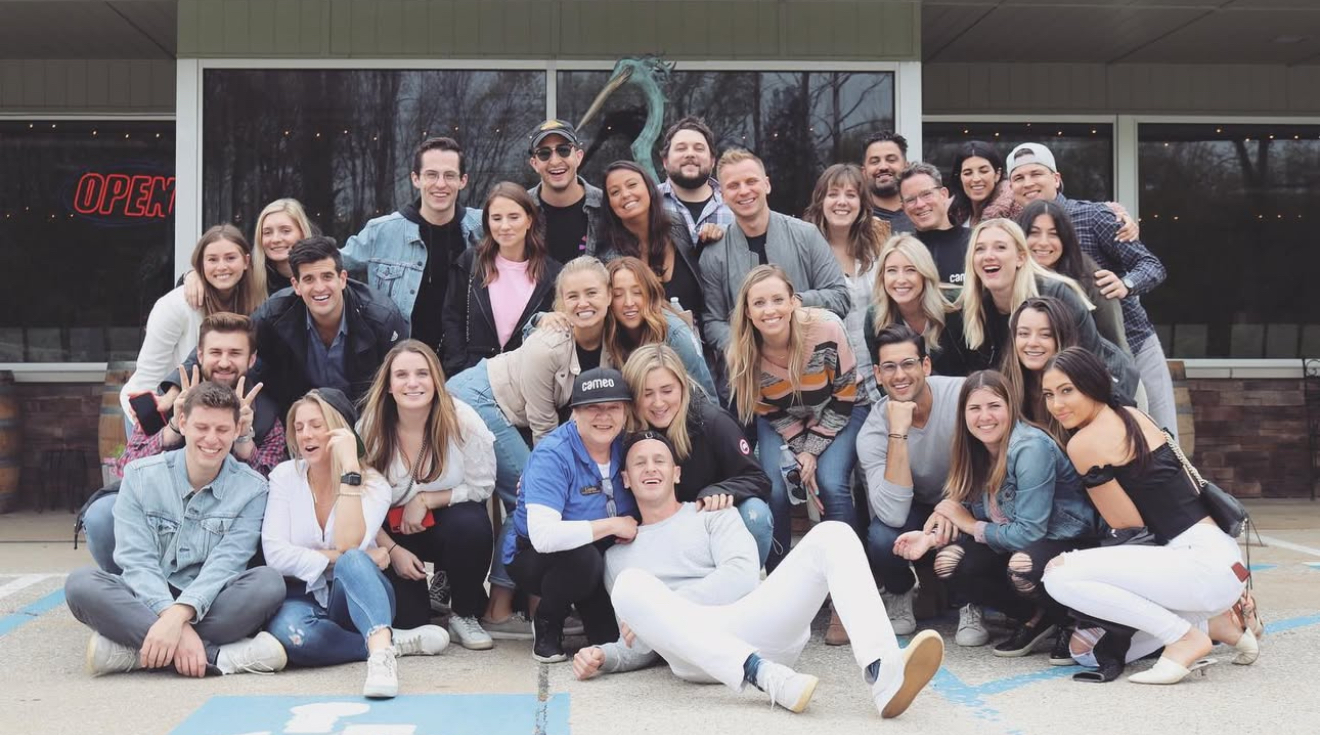 image of hands typing on a laptop with scientific data