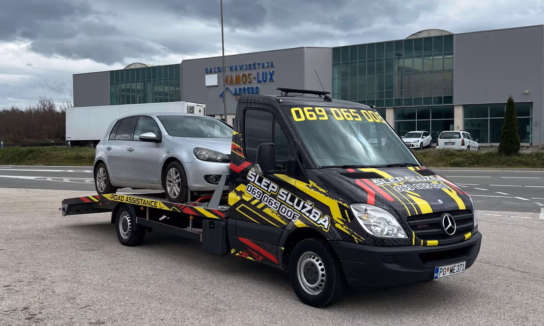 Tow truck towing a car