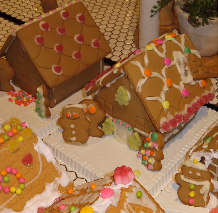 A picture of hand-made gingerbread houses.