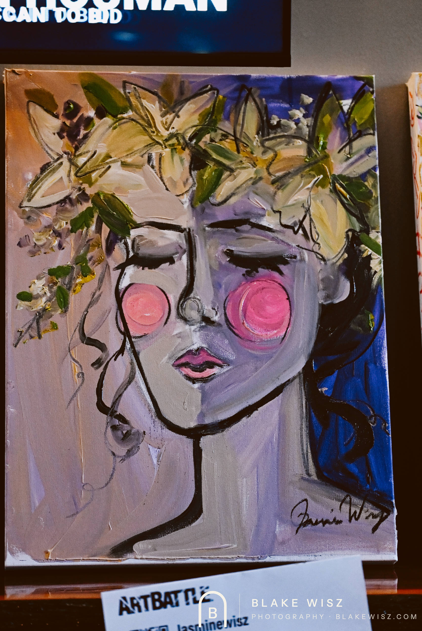 Jasmine Wisz's finished painting, a violet face crowned with white lilies, signed on canvas