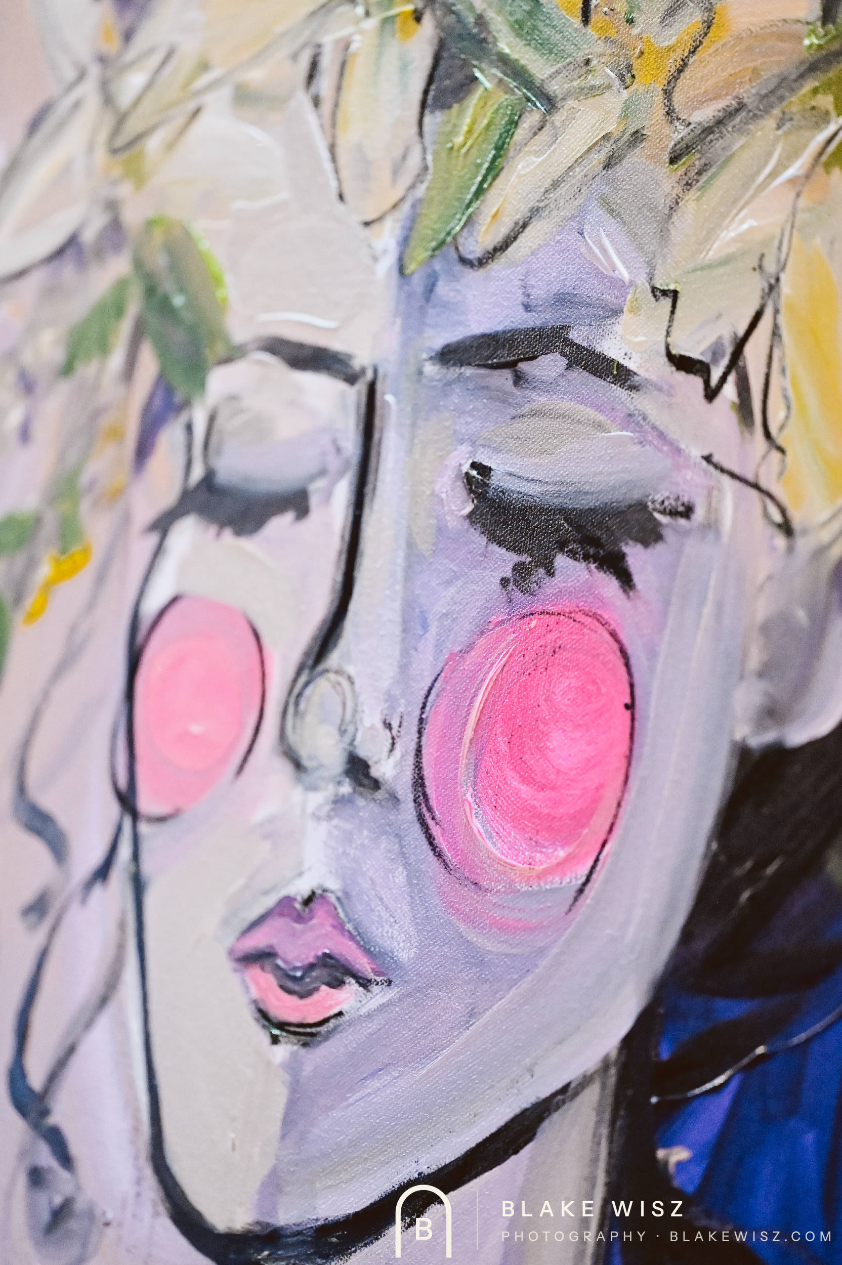 Close-up of Jasmine Wisz's finished portrait, a violet face crowned with white lilies