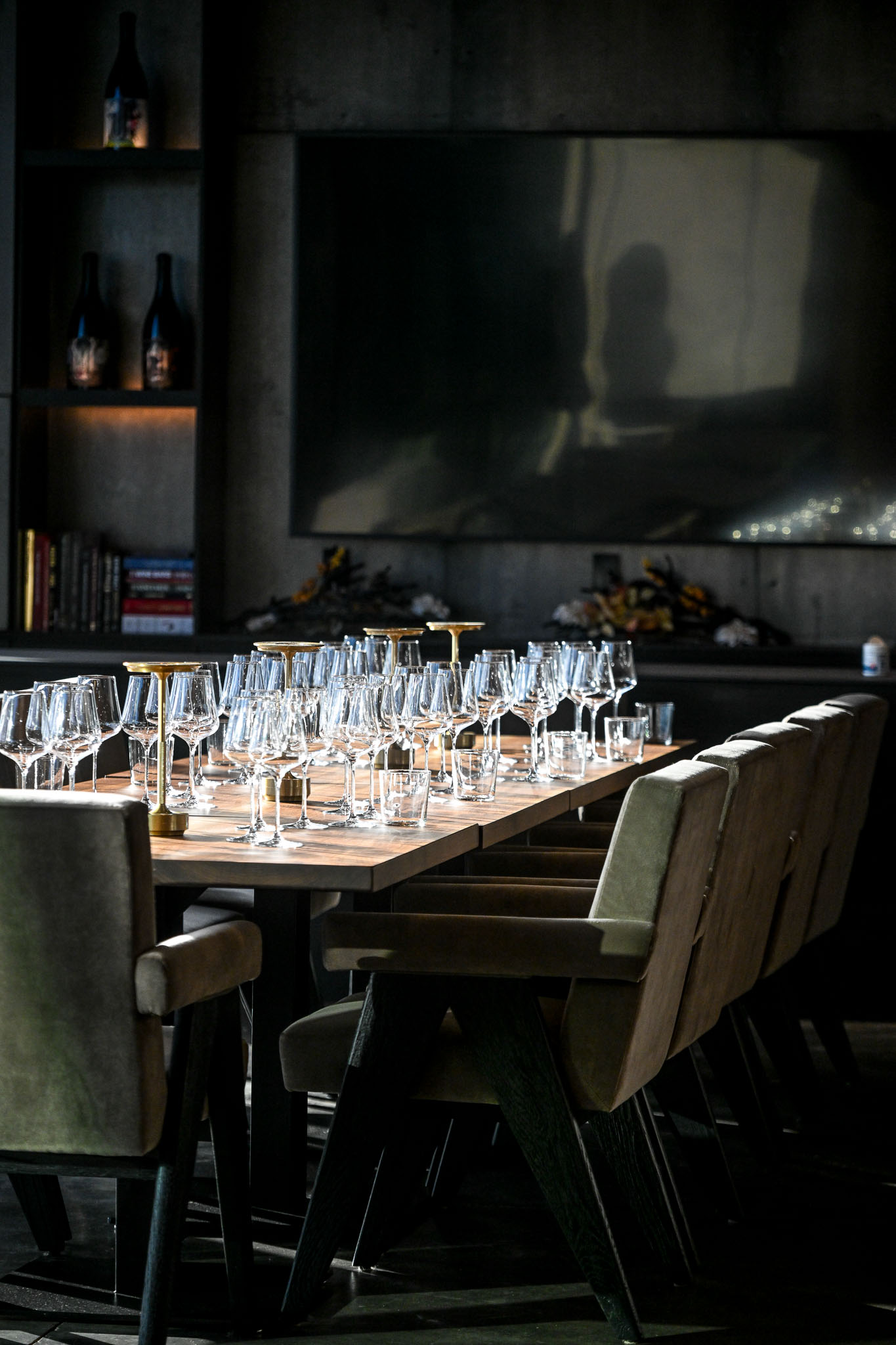 Tasting table set with rows of wine glasses in the LucidWild Estate tasting room
