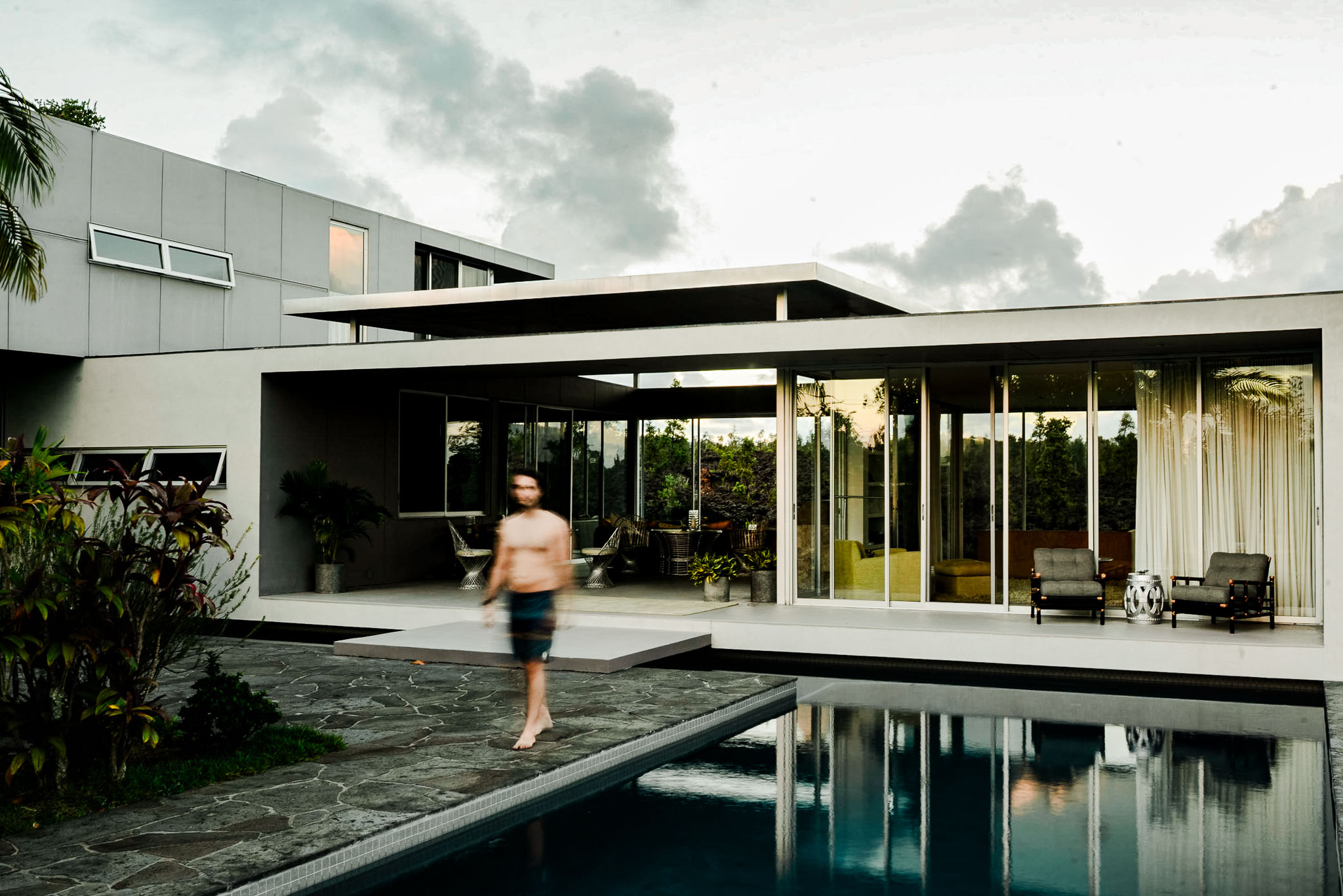 The Trickey House across the pool at midday