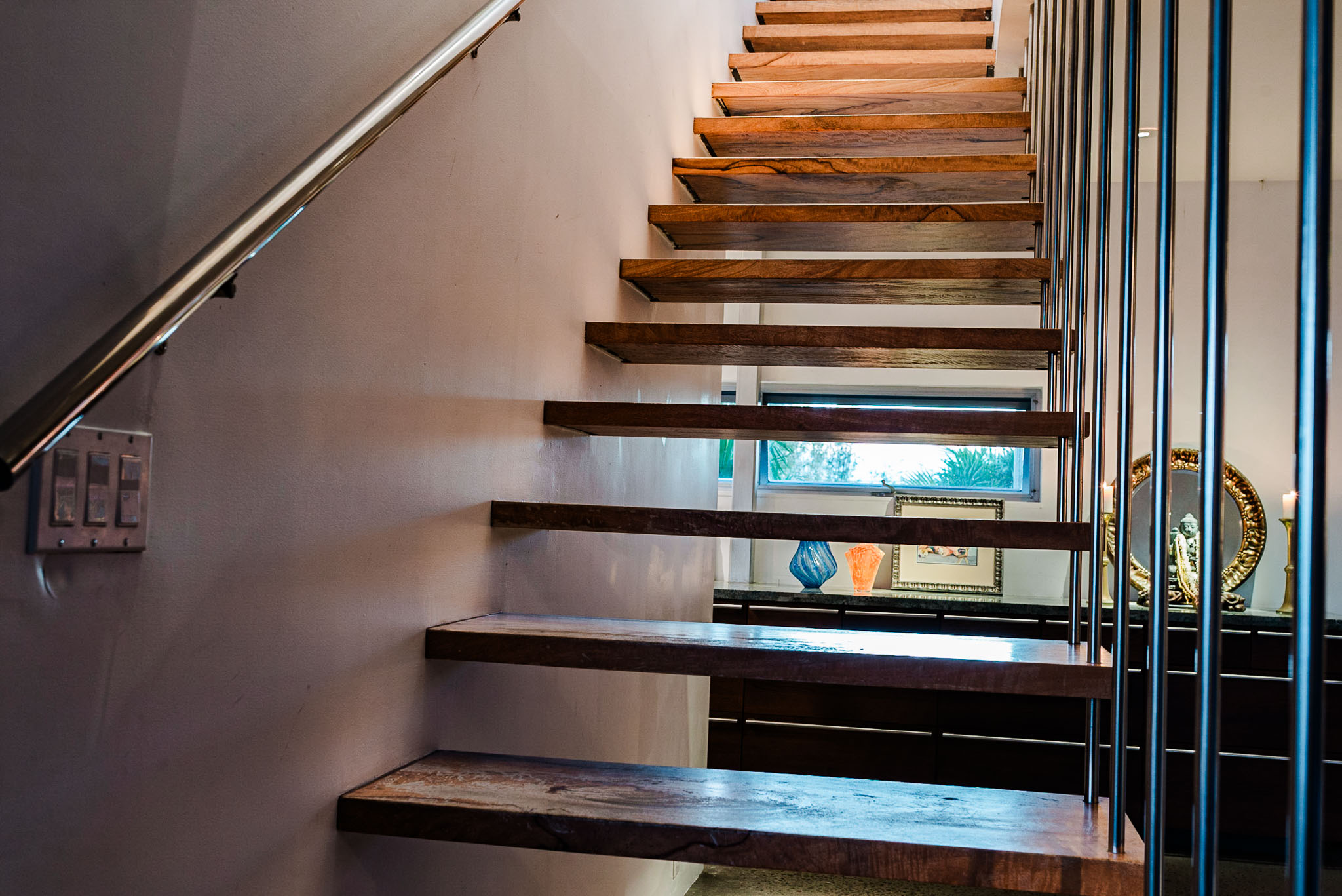 The cantilevered mango stair seen from below