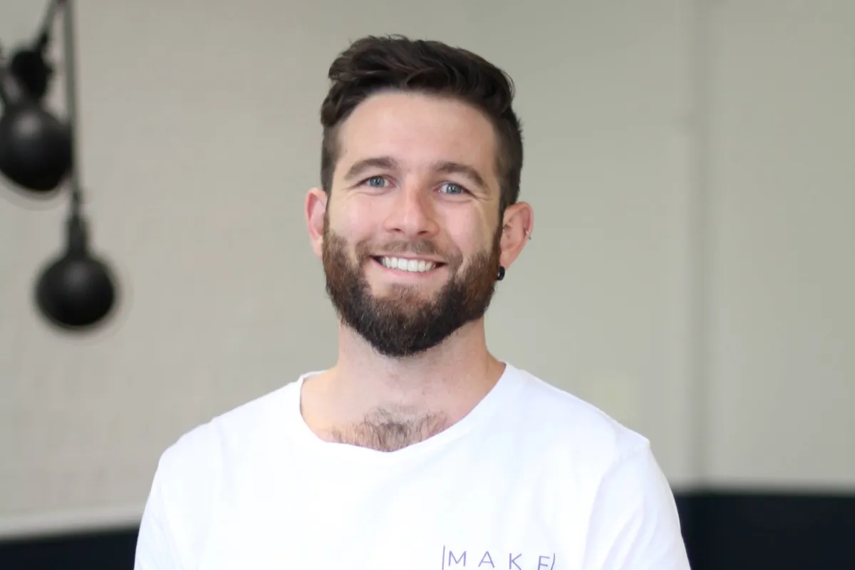 A happy founder celebrating their ai digital marketer