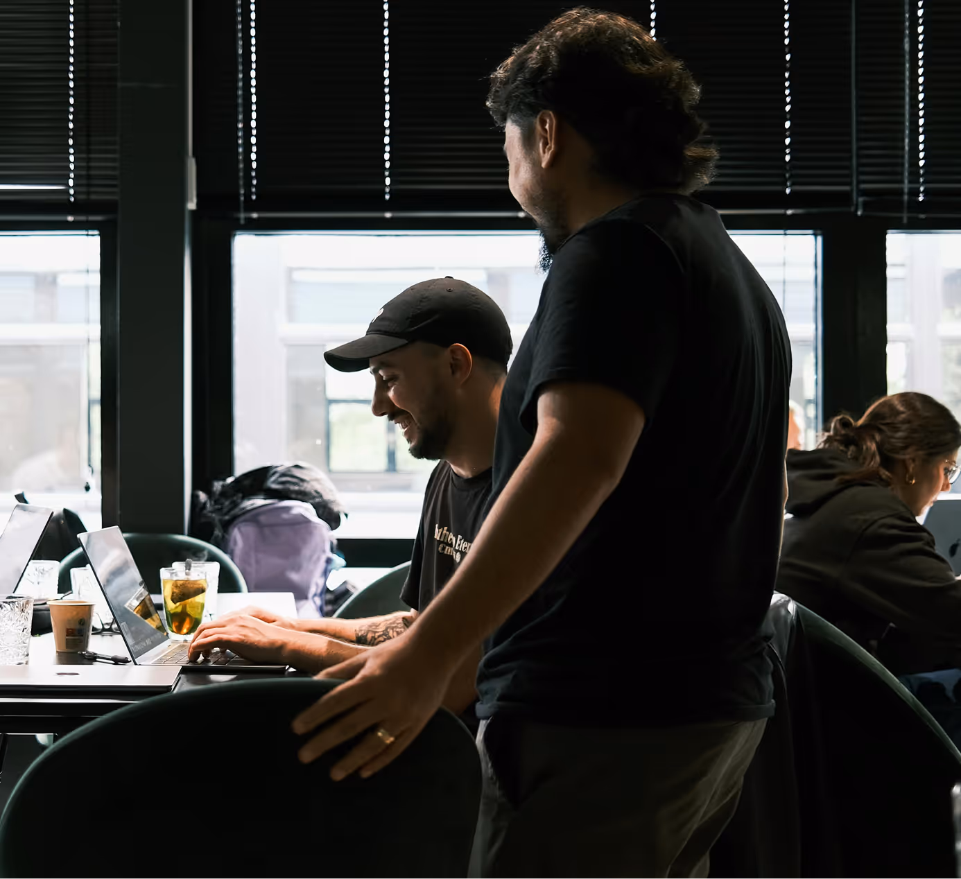 teammates working at the office