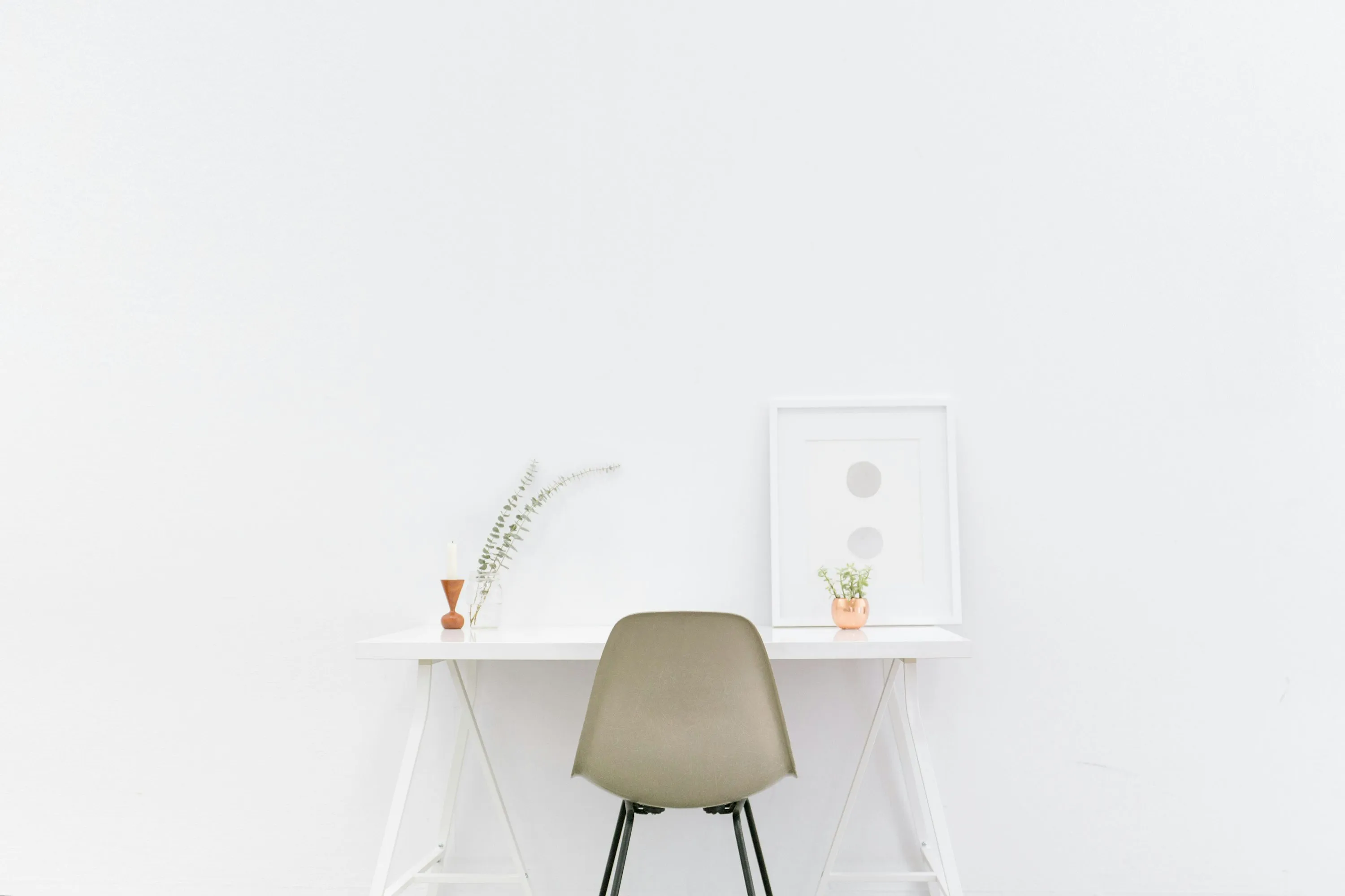 white wooden table near brown chair