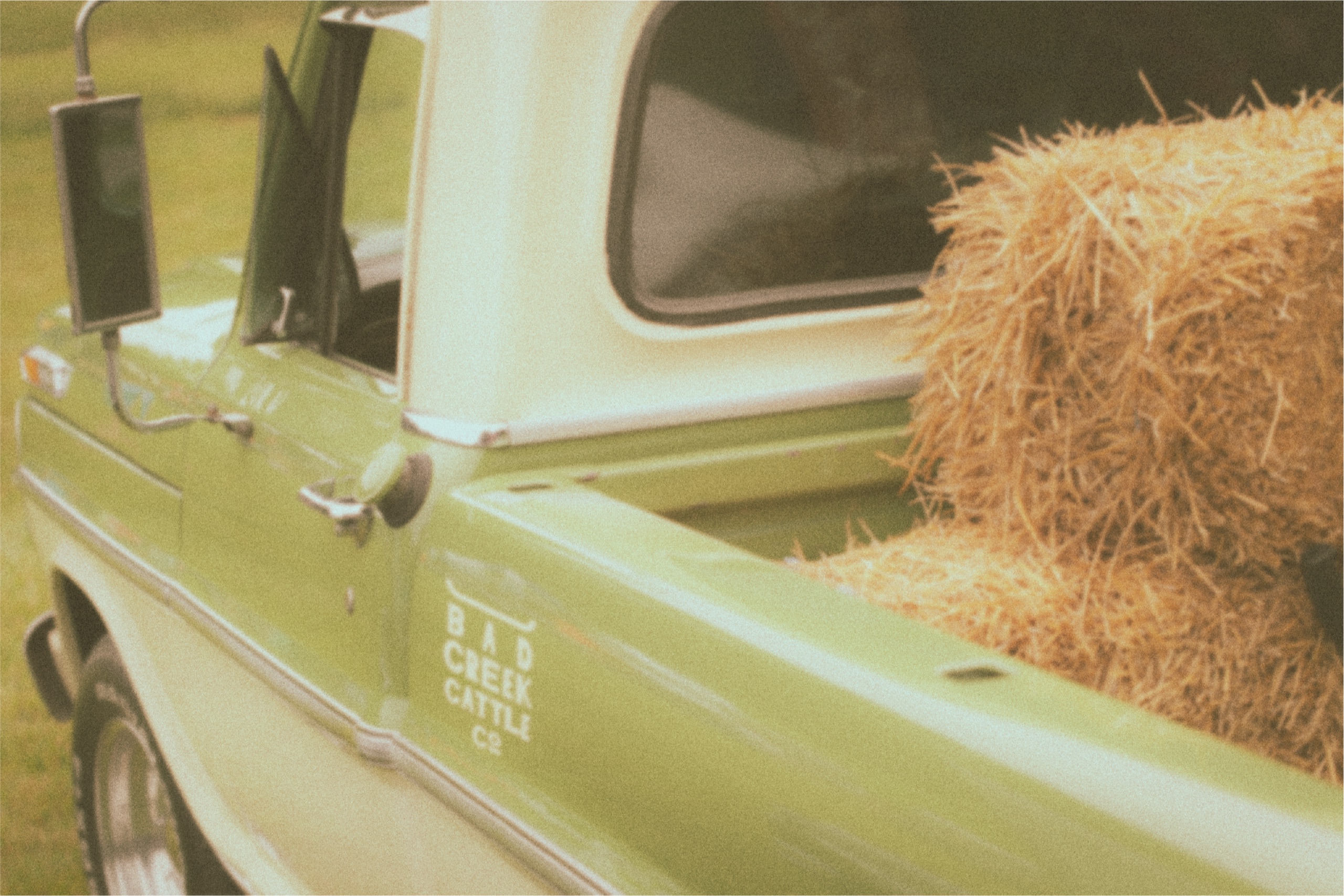 The Bad Creek farm truck with the brandmark on the door