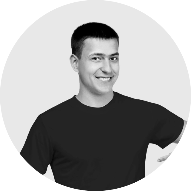 Professional profile photo of a person smiling in business attire