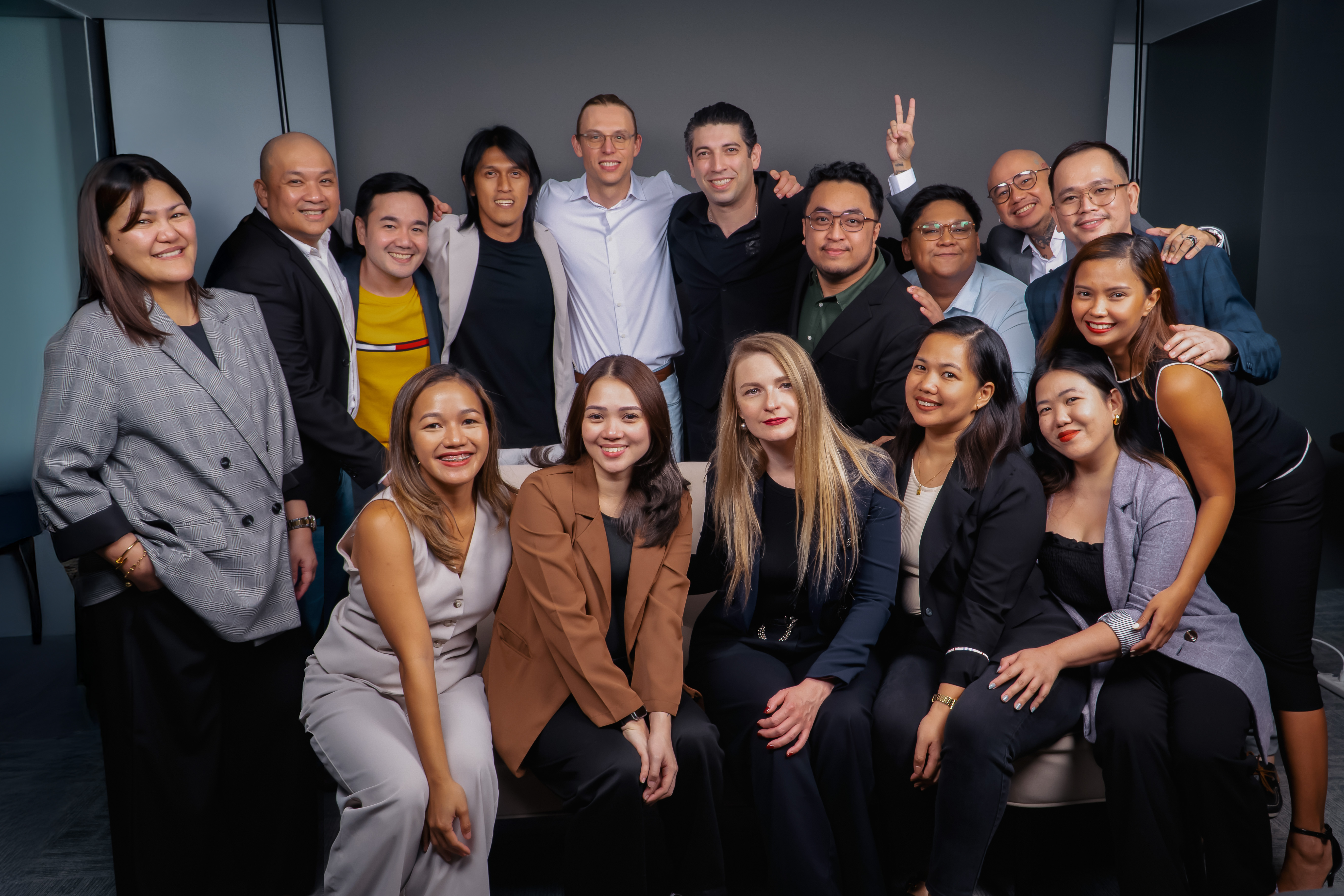 Diverse professional team photo with smiling colleagues in office setting