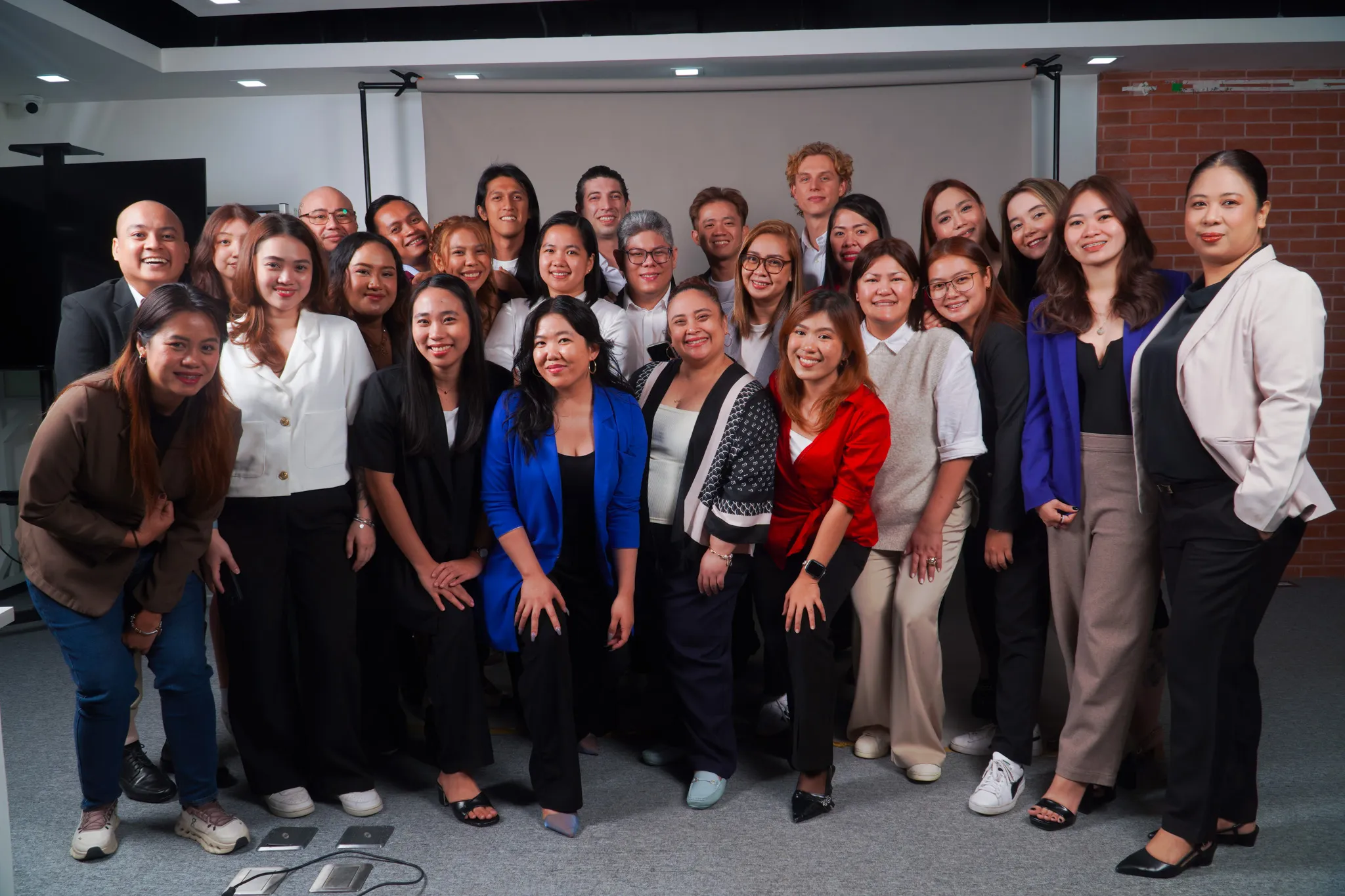 The full Stellar Staff team posing together for a group photo in the office