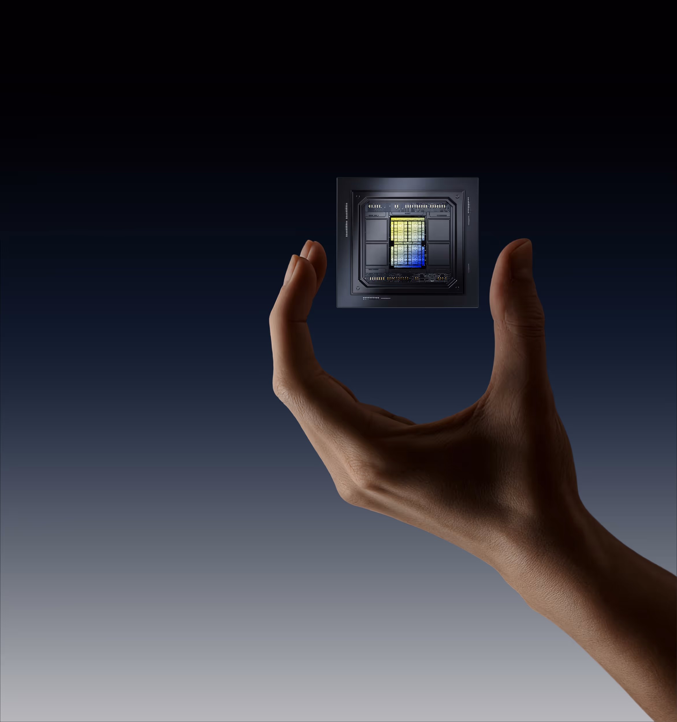 Tensordyne silicon chip floating in a hand