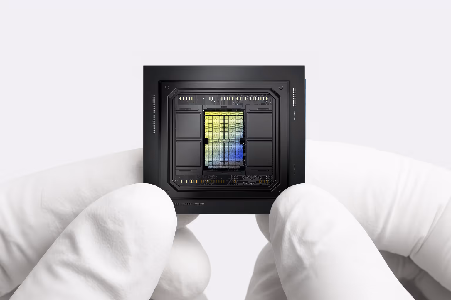 Close-up of an advanced AI microchip held in white gloves