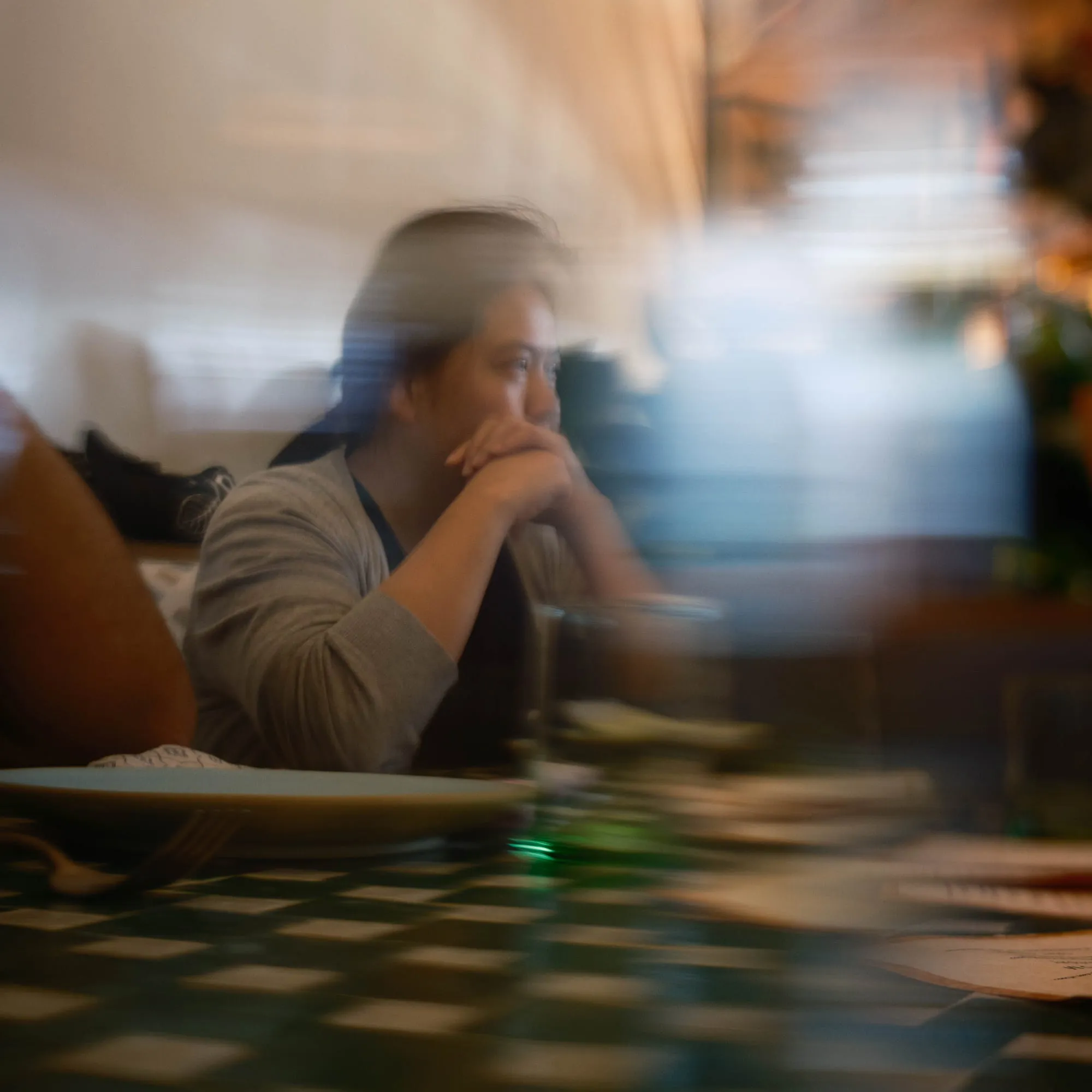 Abstract photo of a young woman inside an office room