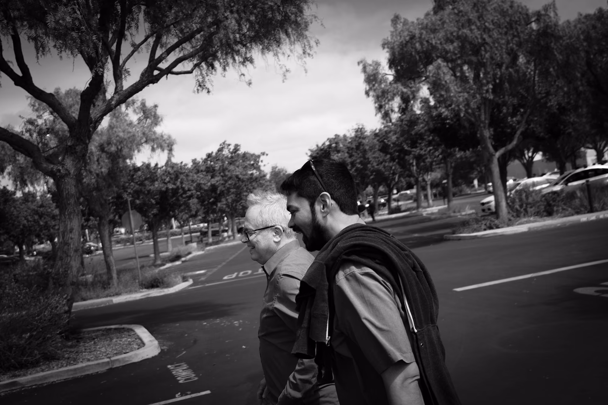 Two Tensordyne colleagues walking outside and having a conversation