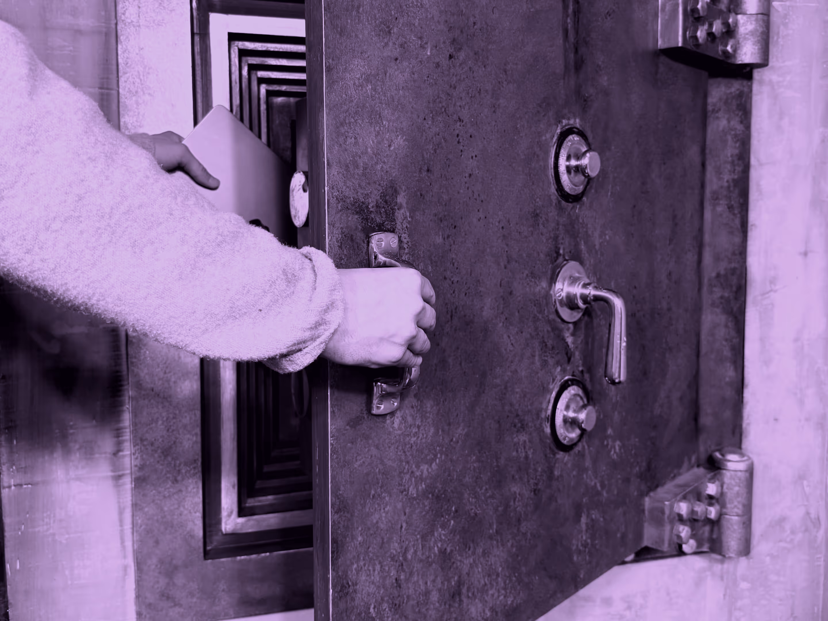 person opening a vault