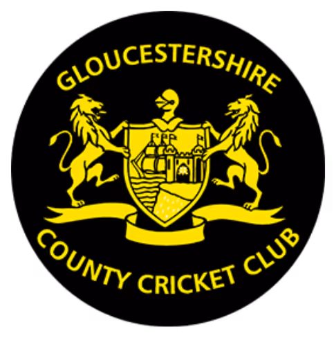 Gloucestershire County Cricket Club logo featuring a shield held by two lions and a knight's helmet above.