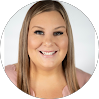 Smiling Red Team IT team member ready to provide managed IT support and cybersecurity services in Denton TX