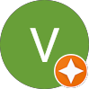 Green circle avatar with white letter V and orange badge icon, representing a verified IT professional profile