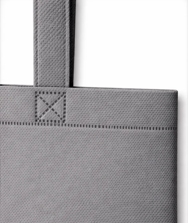 Ultrasonically welded non-woven polypropylene bag detail showing reinforced handle seam