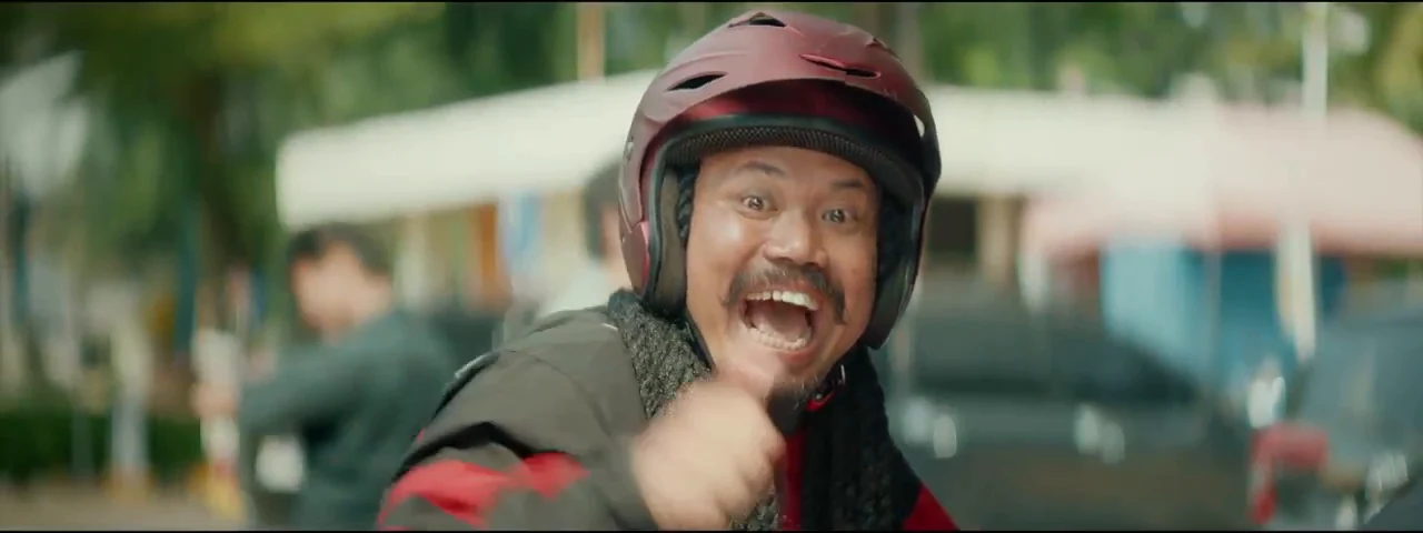 Motorcycle rider in the original LPS TVC