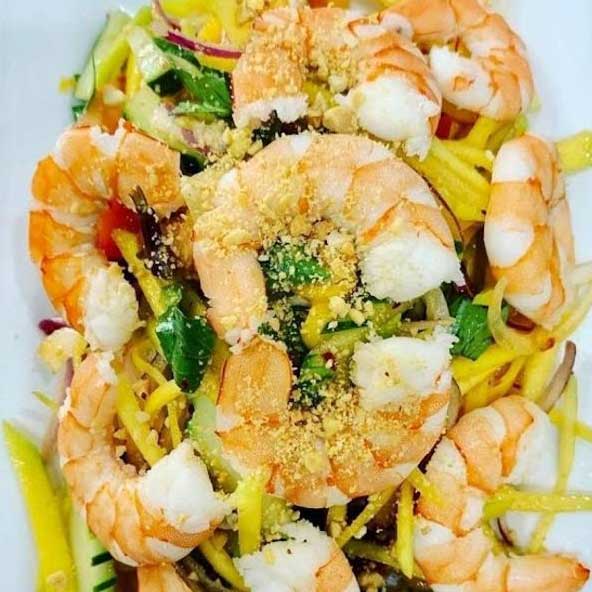 Mango Shimrp salad on a white plate