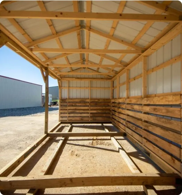 Interior view of metal horse barn by Backyard & Beyond in Missouri