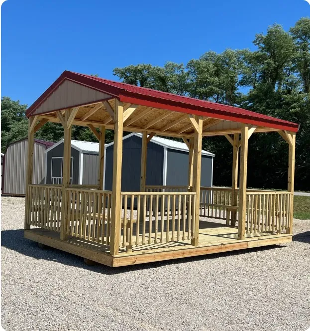Red wood and metal pavilion by Backyard & Beyond in Missouri