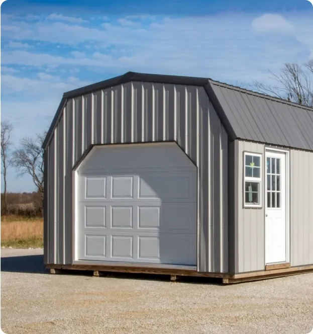 Grey lofted garage with metal exterior by Backyard & Beyond in Missouri