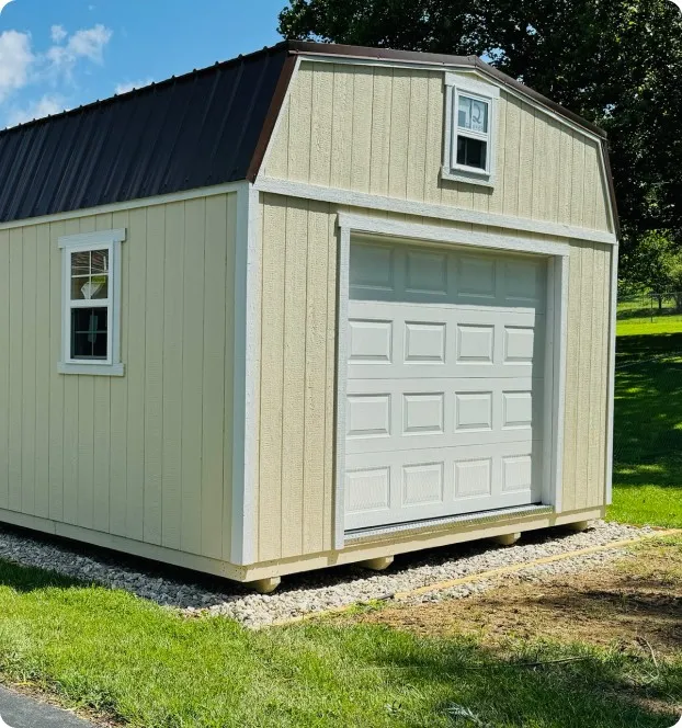 Lofted garage with wood exterior by Backyard & Beyond in Missouri