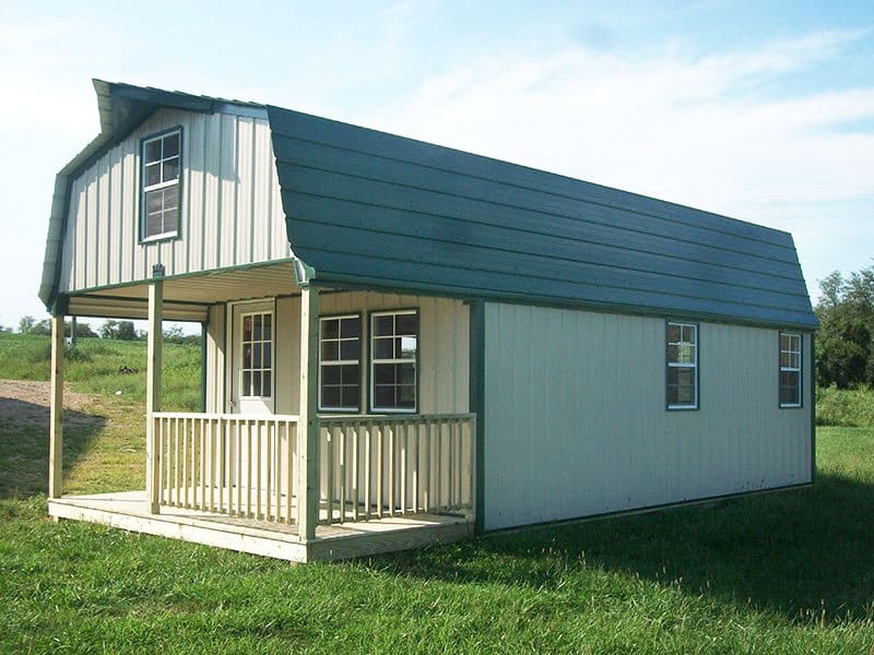 Deluxe high barn cabins lined up on a Missouri lot