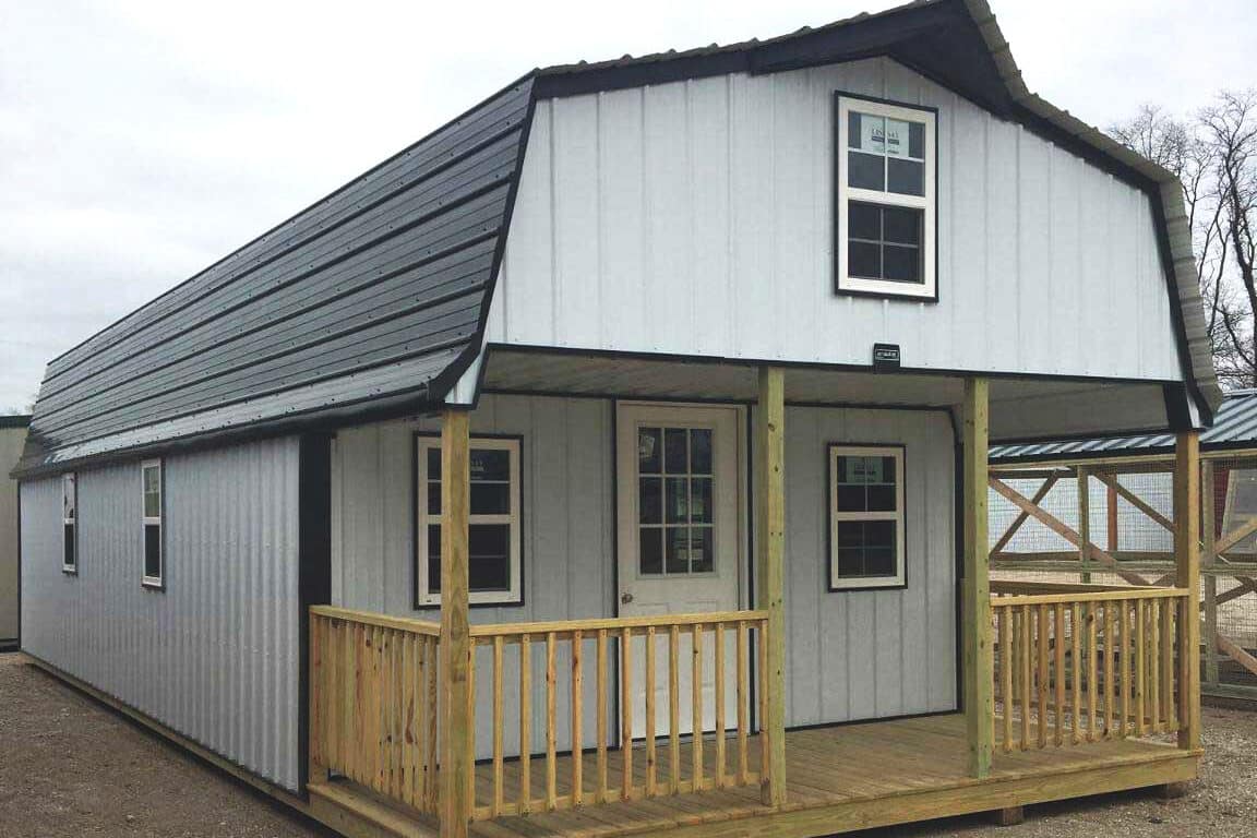 High barn cabin in the gallery with front porch