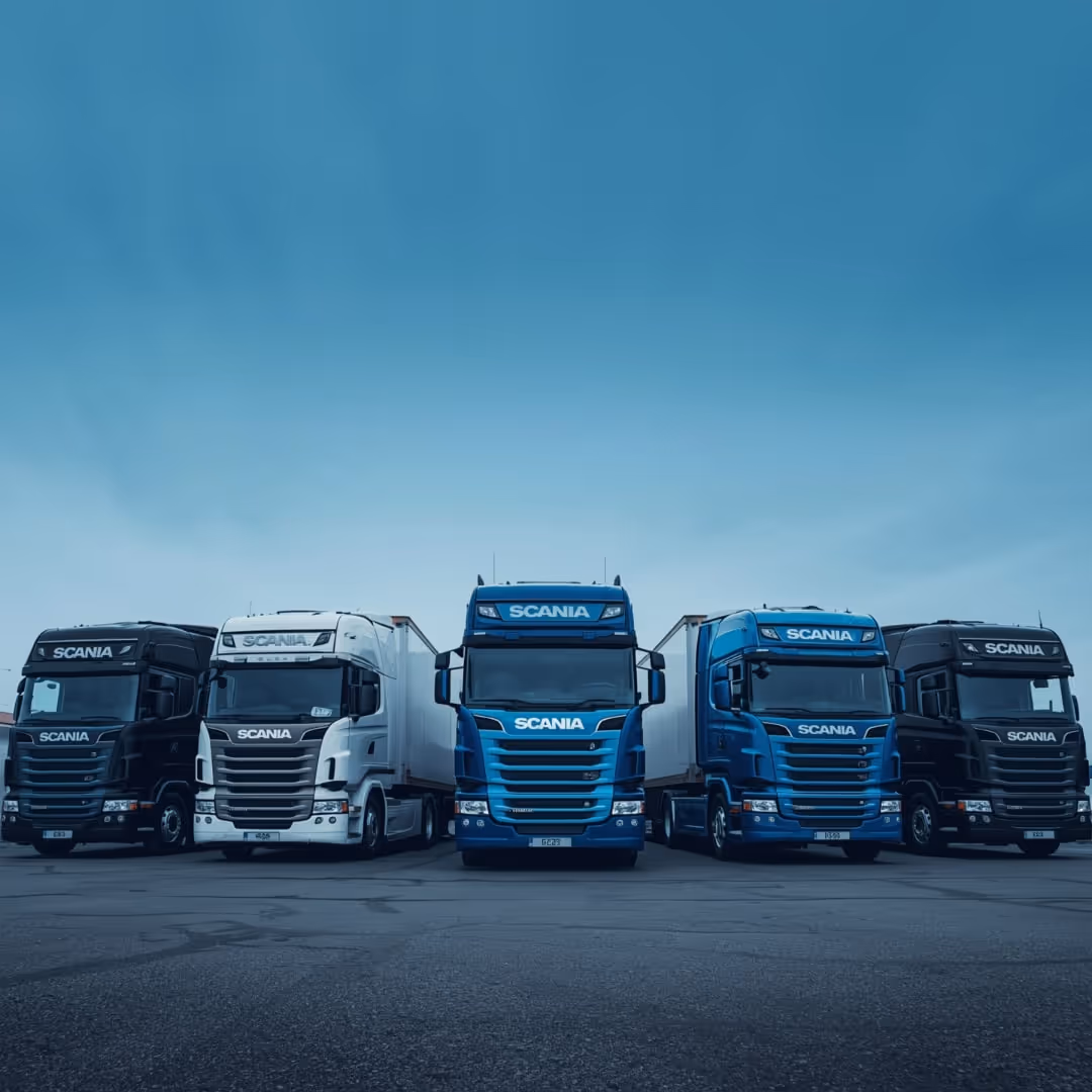 [background image] image of a transport fleet parking area (for a trucking company)