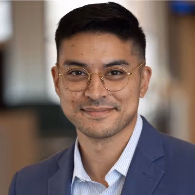 headshot of man smiling