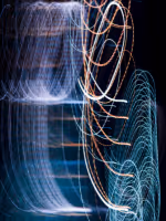 Cosmic sphere of glowing particles symbolizing curiosity, inner exploration, and self-discovery through QHHT® hypnosis at Hype’notic Studio. <a href="https://www.freepik.com/free-photo/blurred-night-lights_4324064.htm">Image by freepik</a>