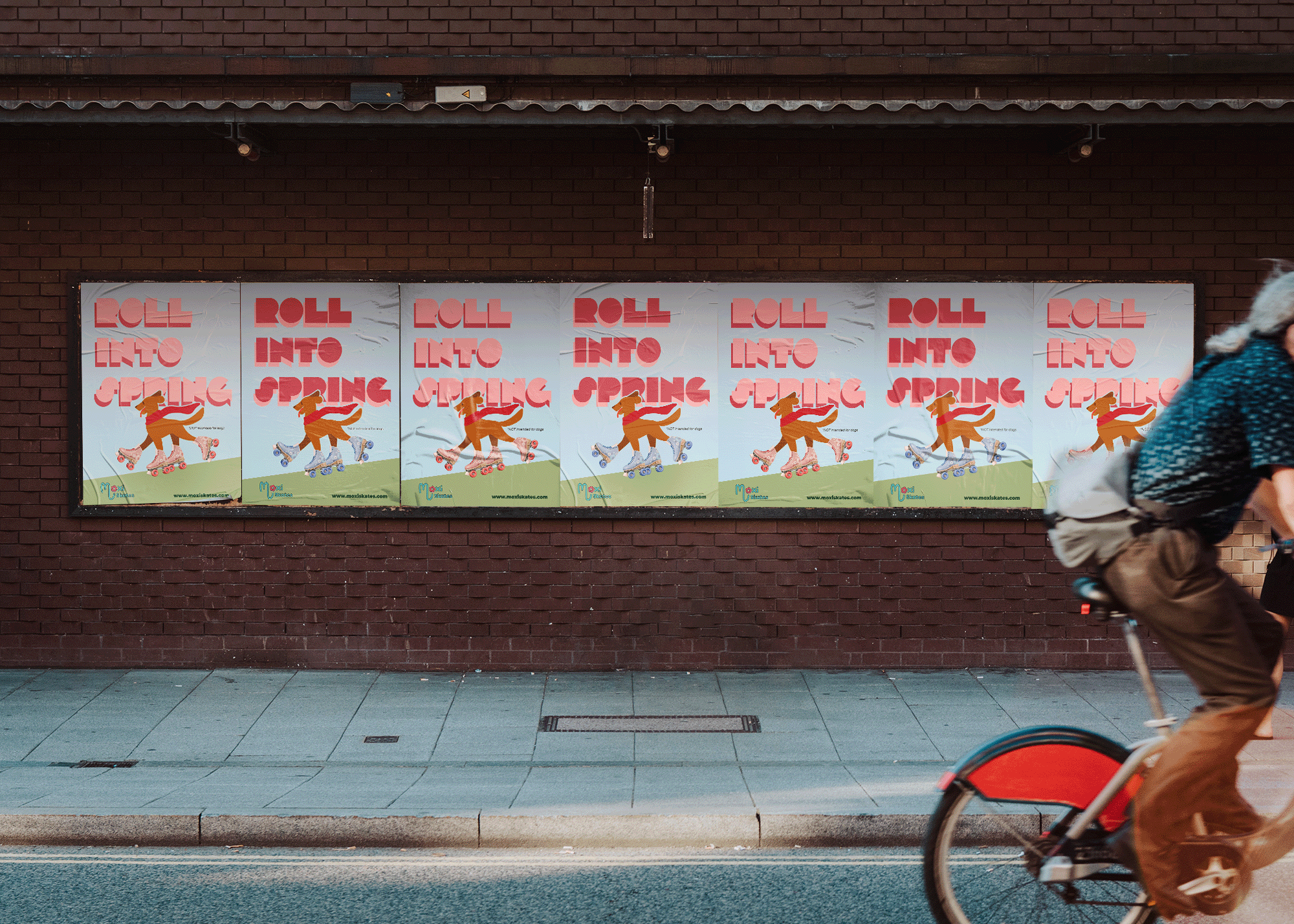 Seven identical posters on a brick wall say 'Roll Into Spring' with an illustrated dog on roller skates, and a person riding a bike passes by in the foreground.